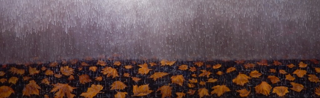 rain falling on dry leaves dropped from the tree