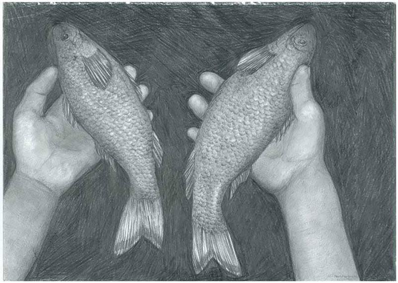 2 fish held in hands 